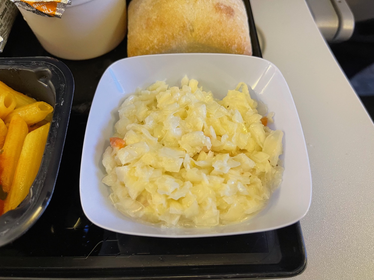 a bowl of food on a tray