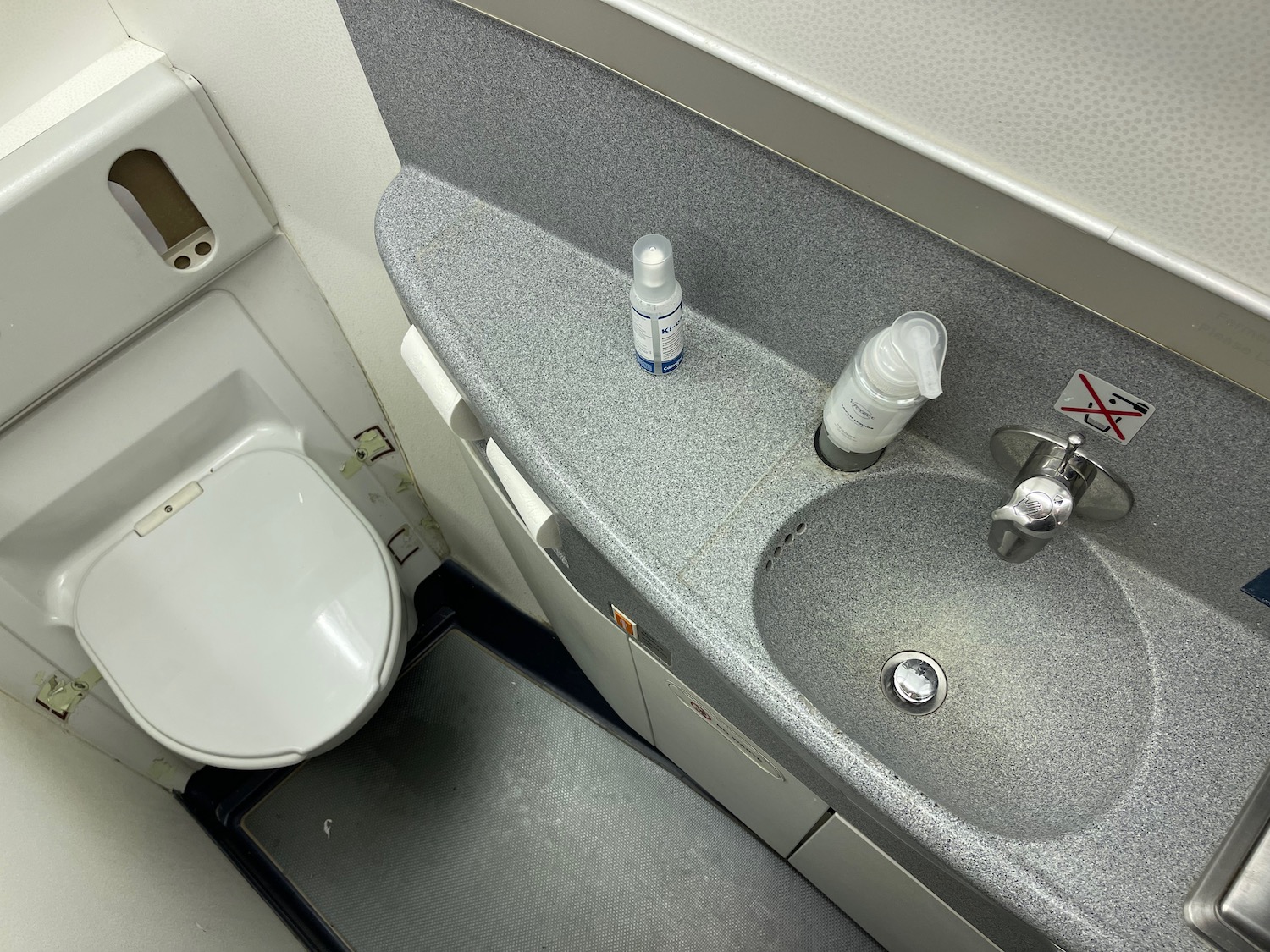 a sink and toilet in a bathroom