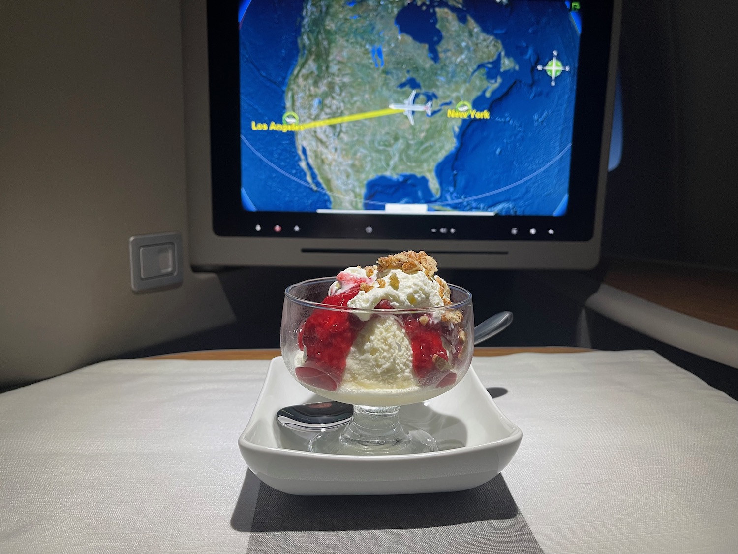 a dish with ice cream and a television on it