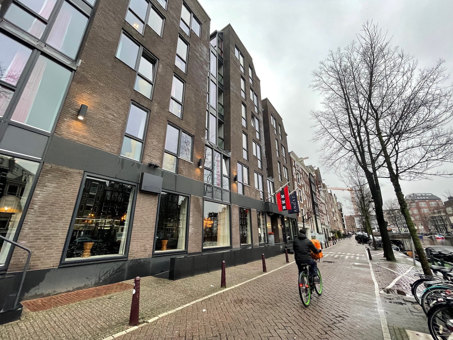 a person riding a bicycle on a street