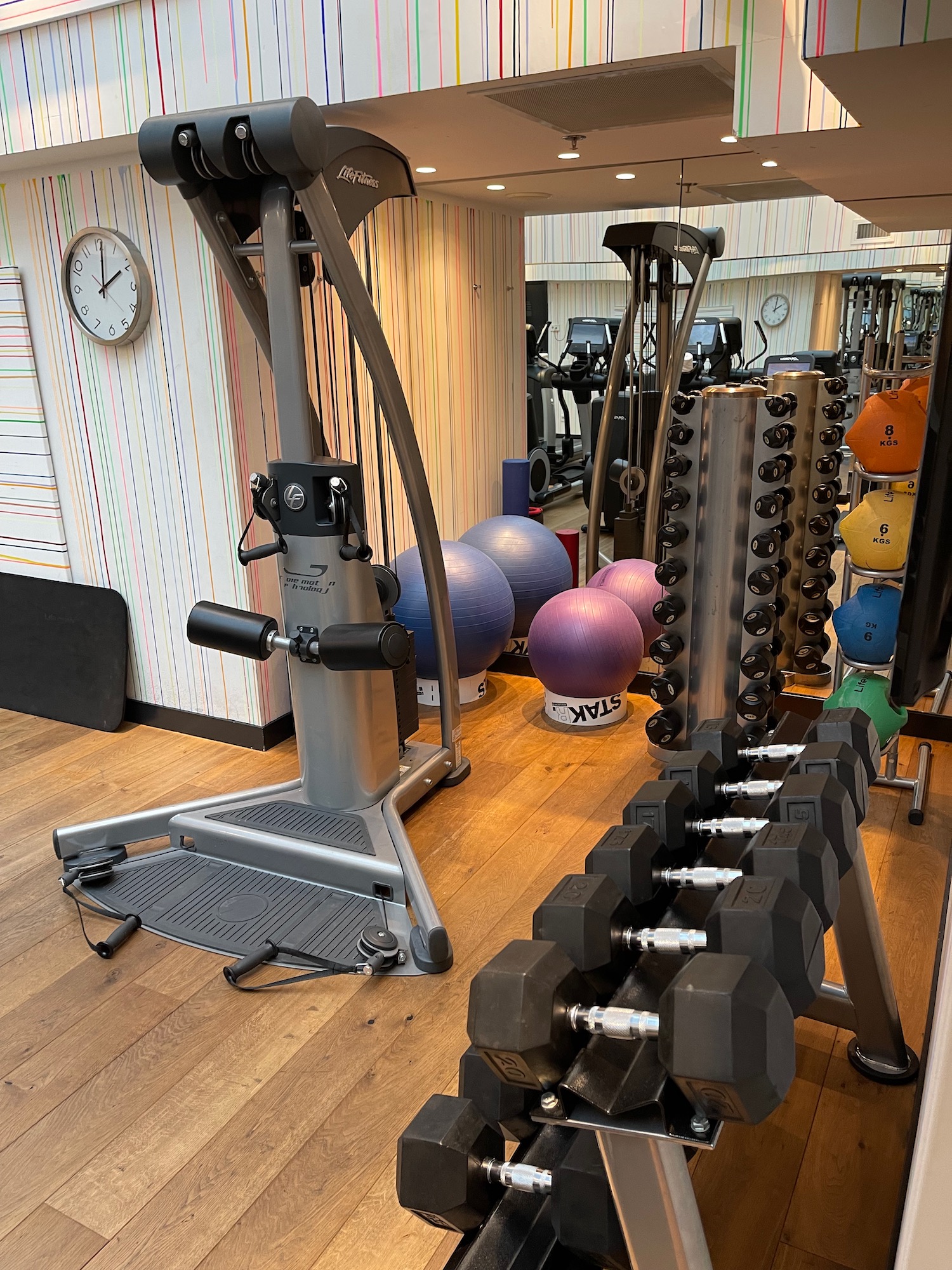 a gym with weights and exercise equipment