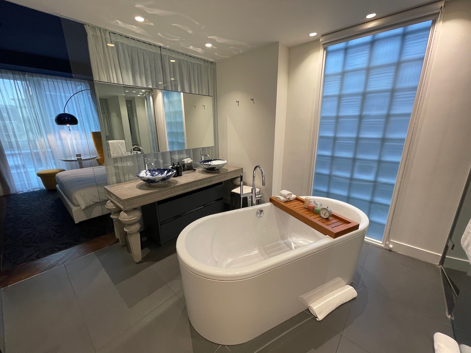 a bathroom with a tub and sink