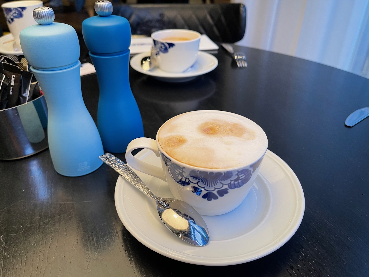 a cup of coffee on a table