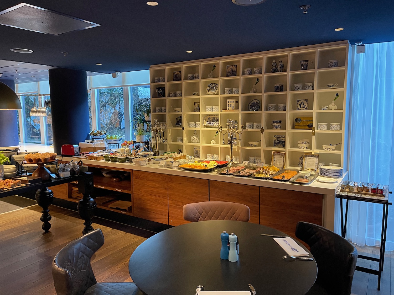 a buffet table with plates and plates on it