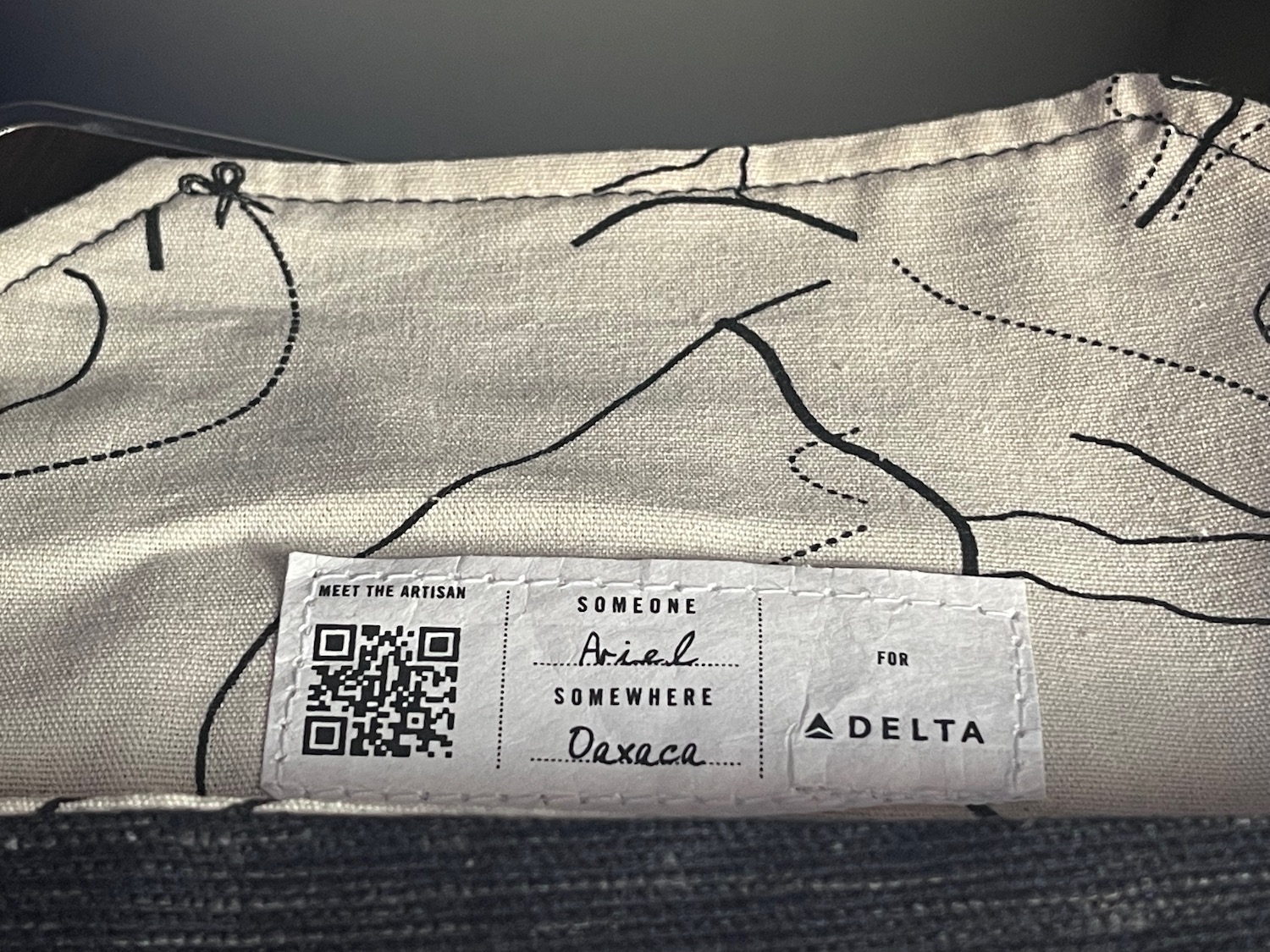 a white label on a fabric surface