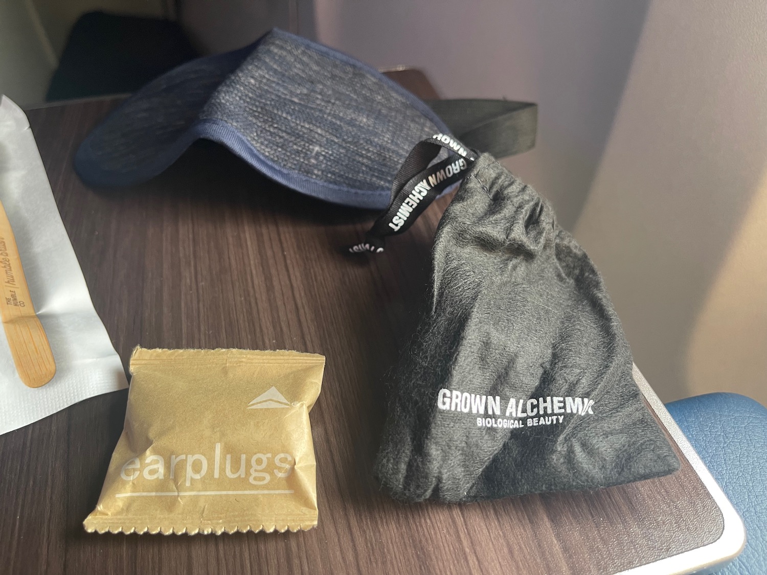 a bag and a pouch on a table