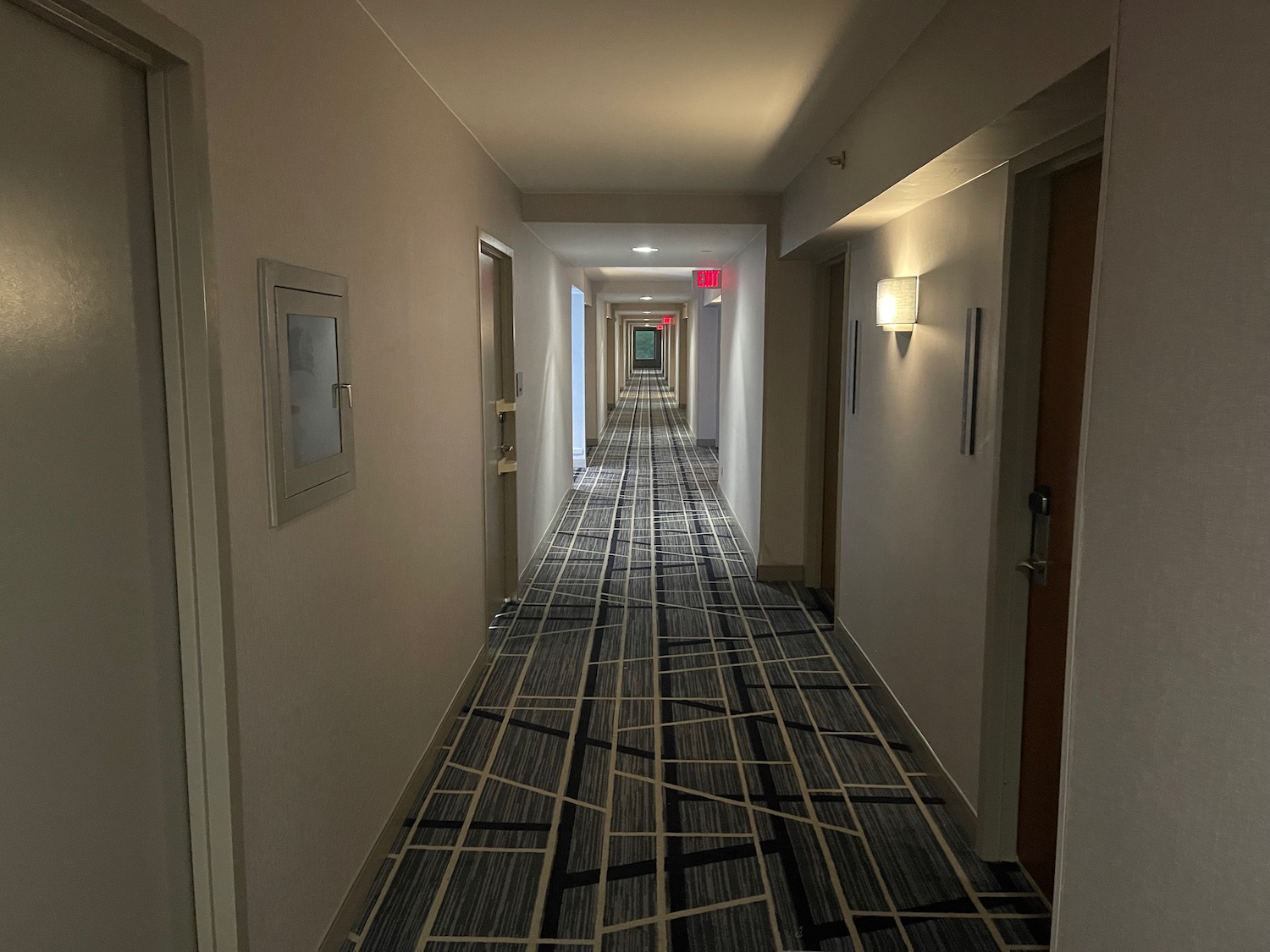 a hallway with a carpeted floor