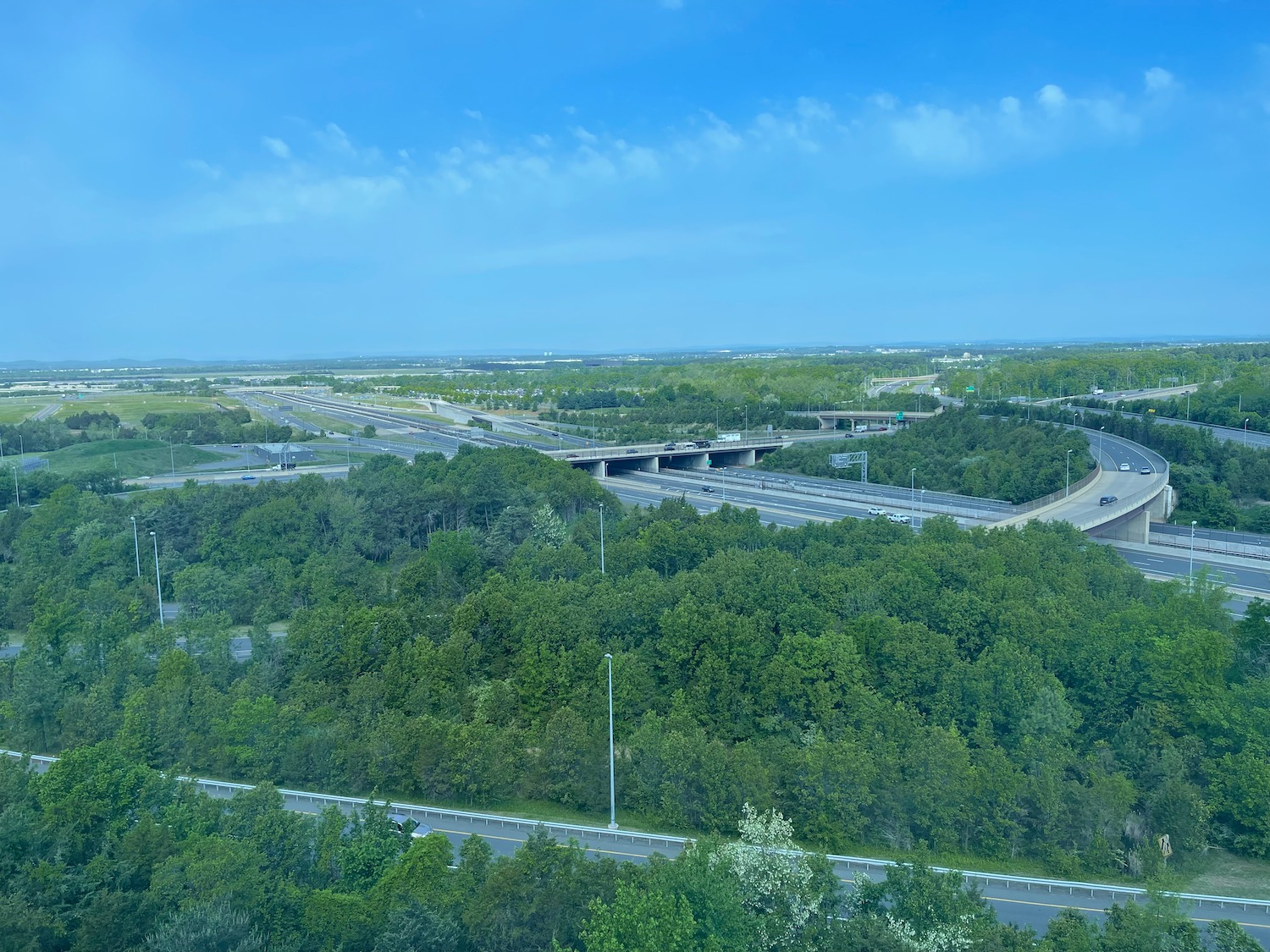 a highway with many roads and trees