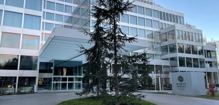 a tree in front of a building