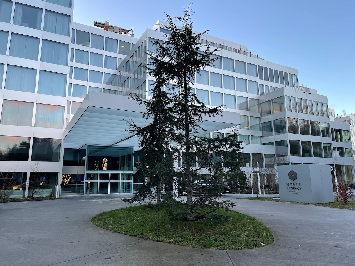 a tree in front of a building