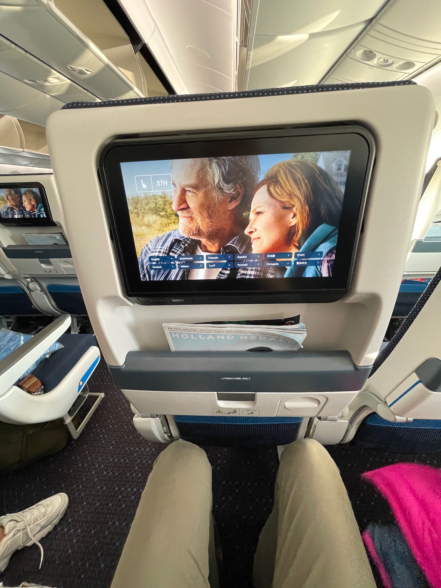 a tv screen on an airplane
