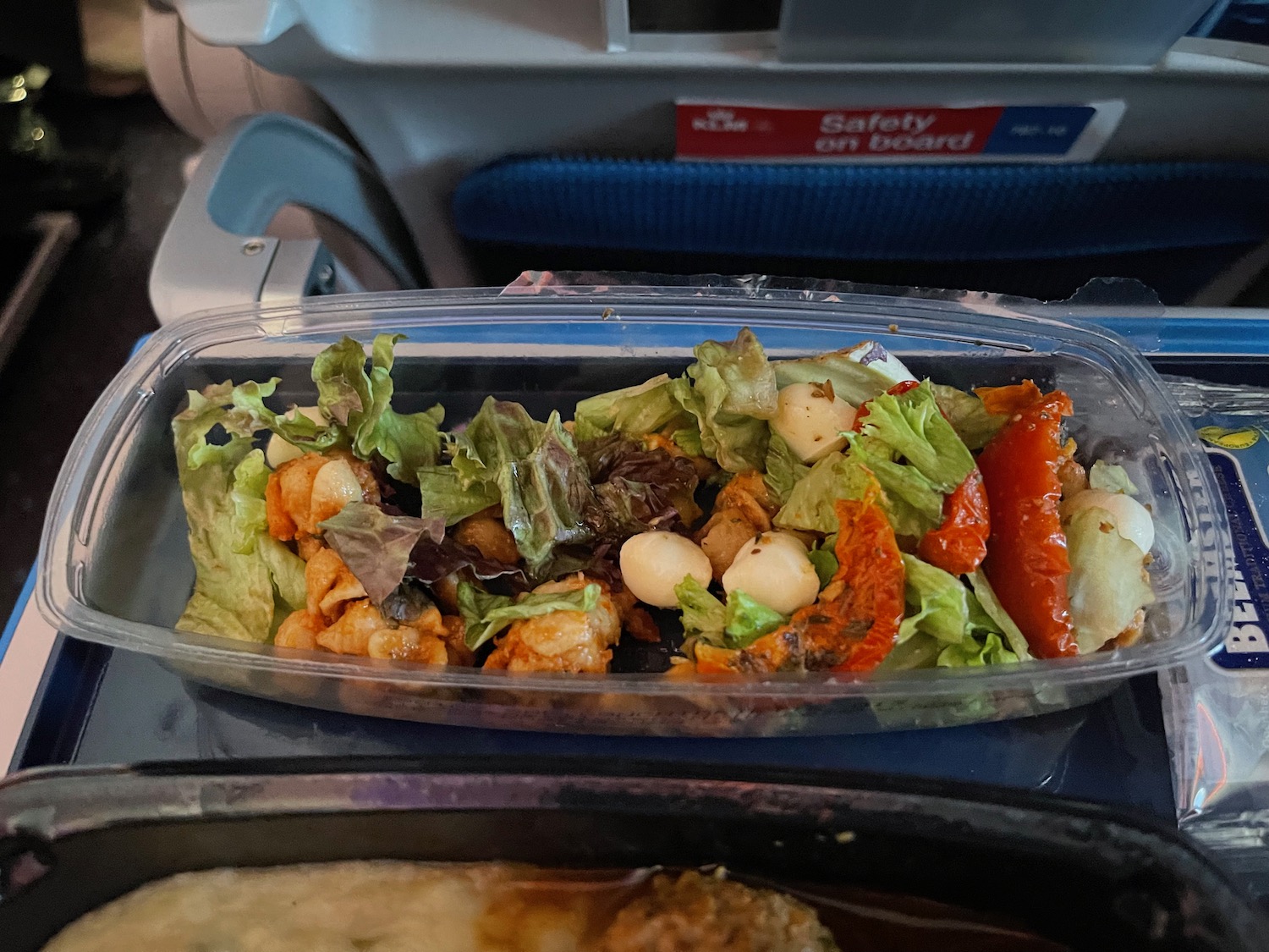 a salad in a plastic container