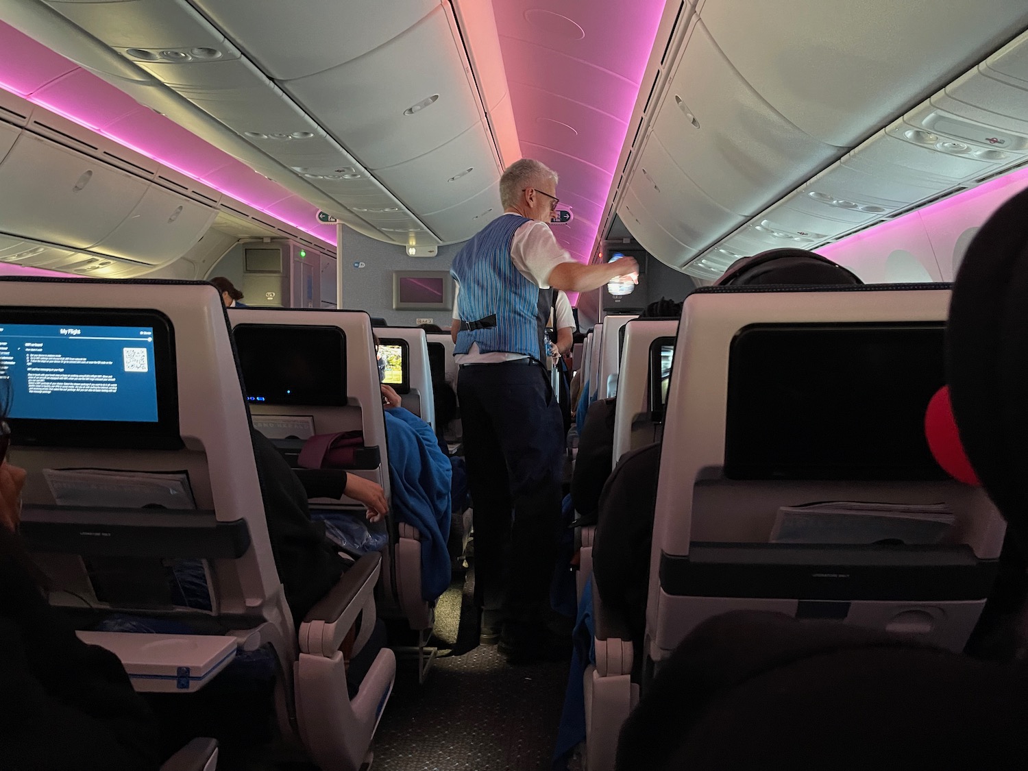 a man standing in an airplane