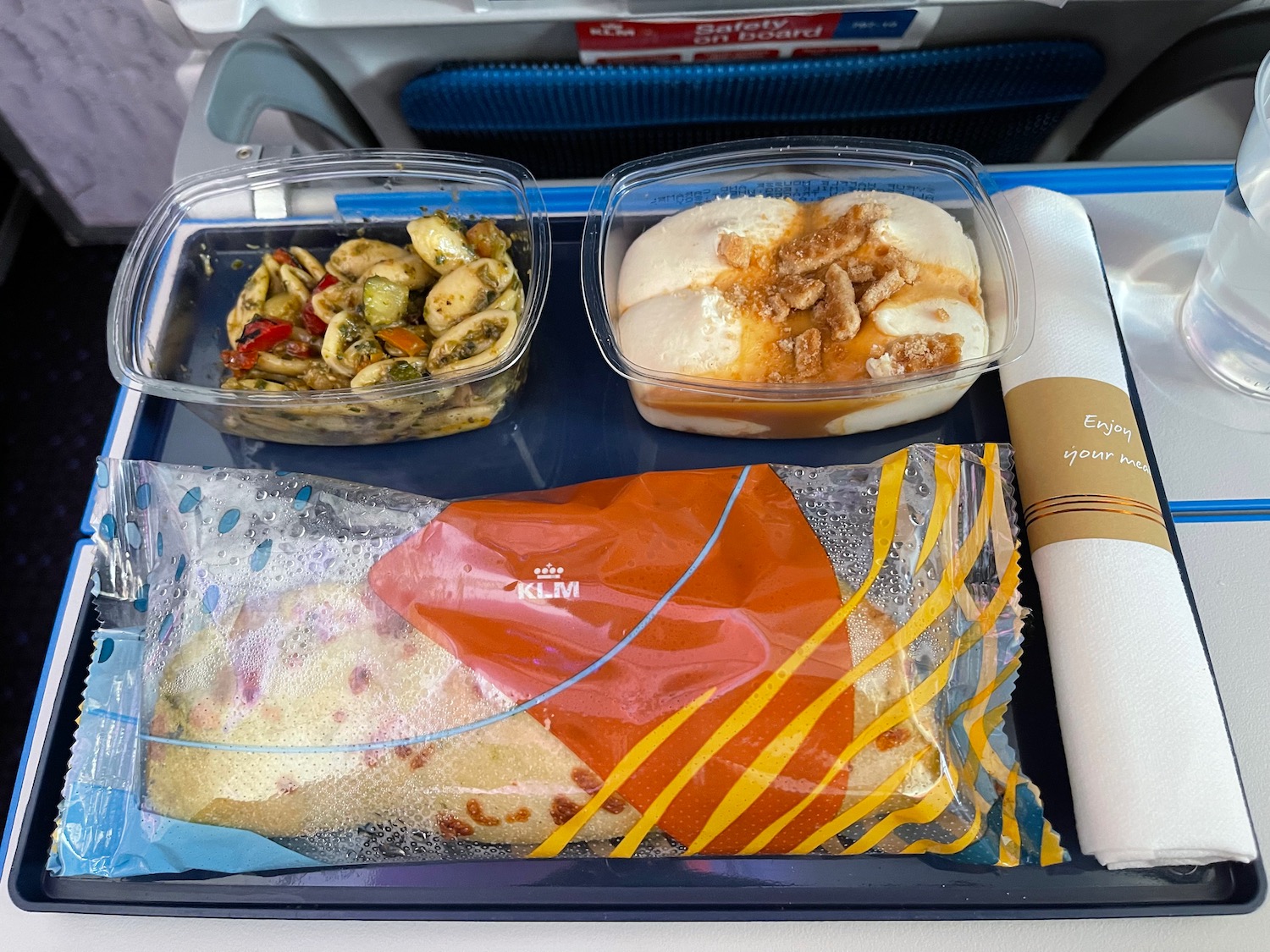 food on a tray on a plane