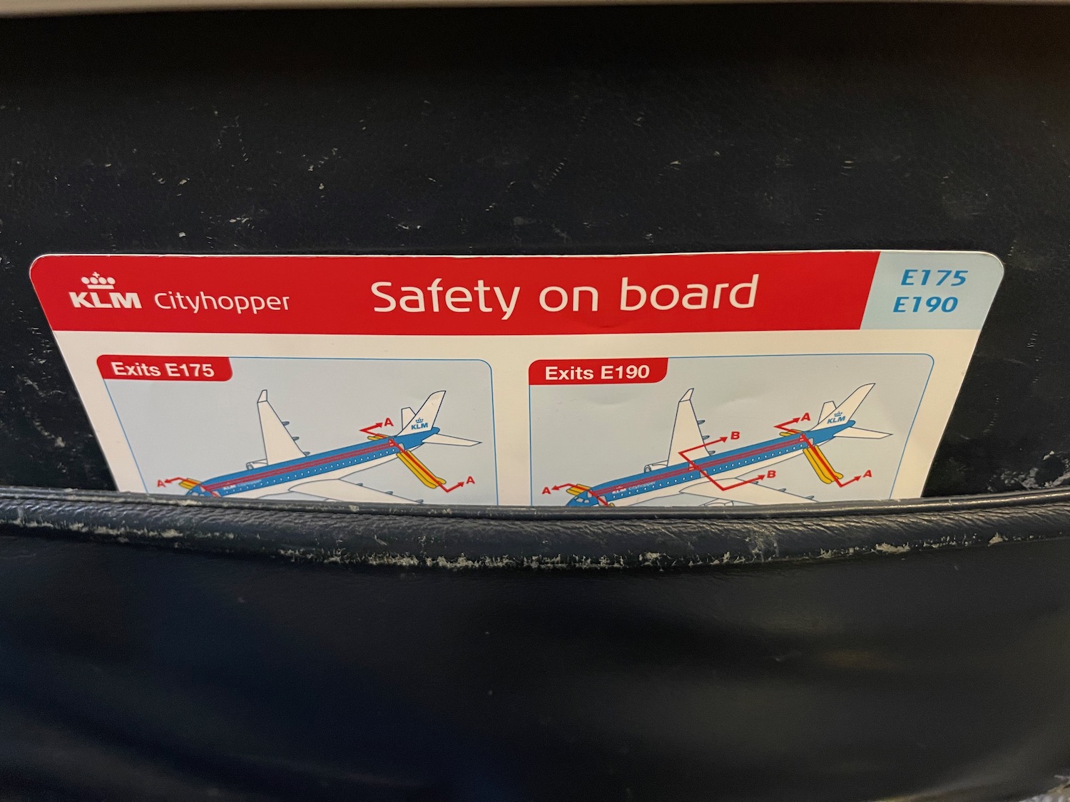 a safety sign on a plane