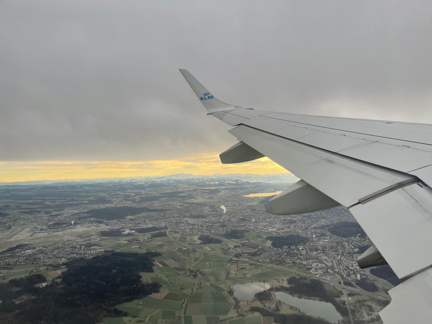 an airplane wing and landscape