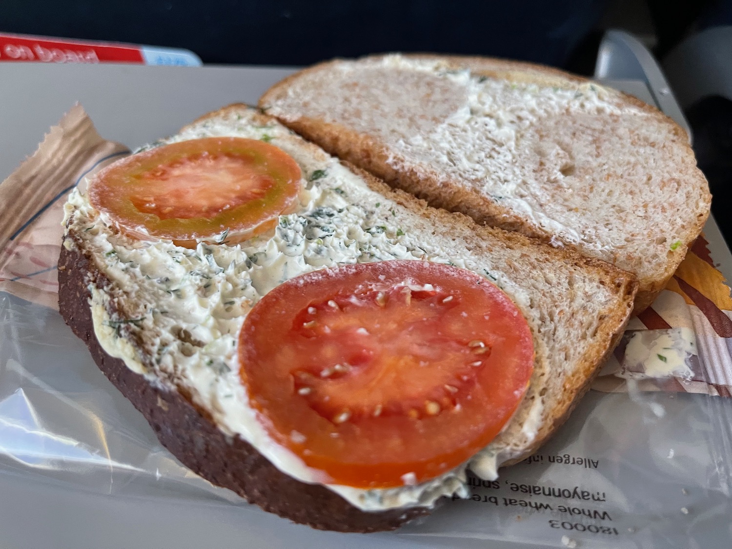 a sandwich with tomatoes on it