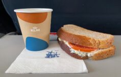 a sandwich and a cup of coffee