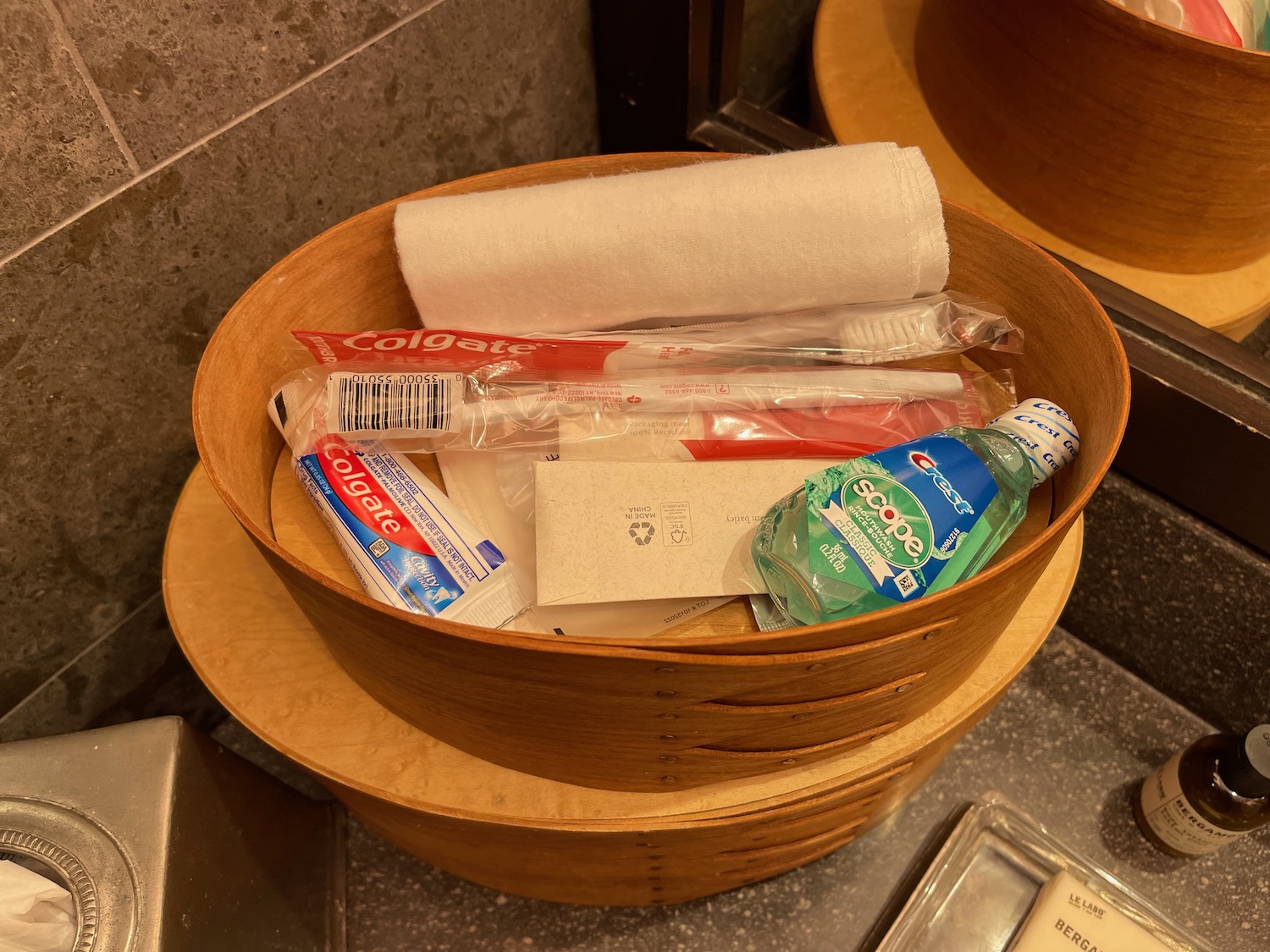 a bowl of toothpaste and toothbrushes