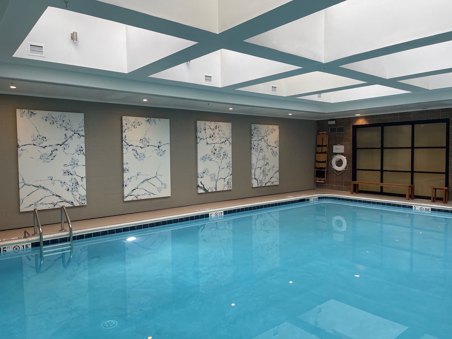 a swimming pool with a white ceiling