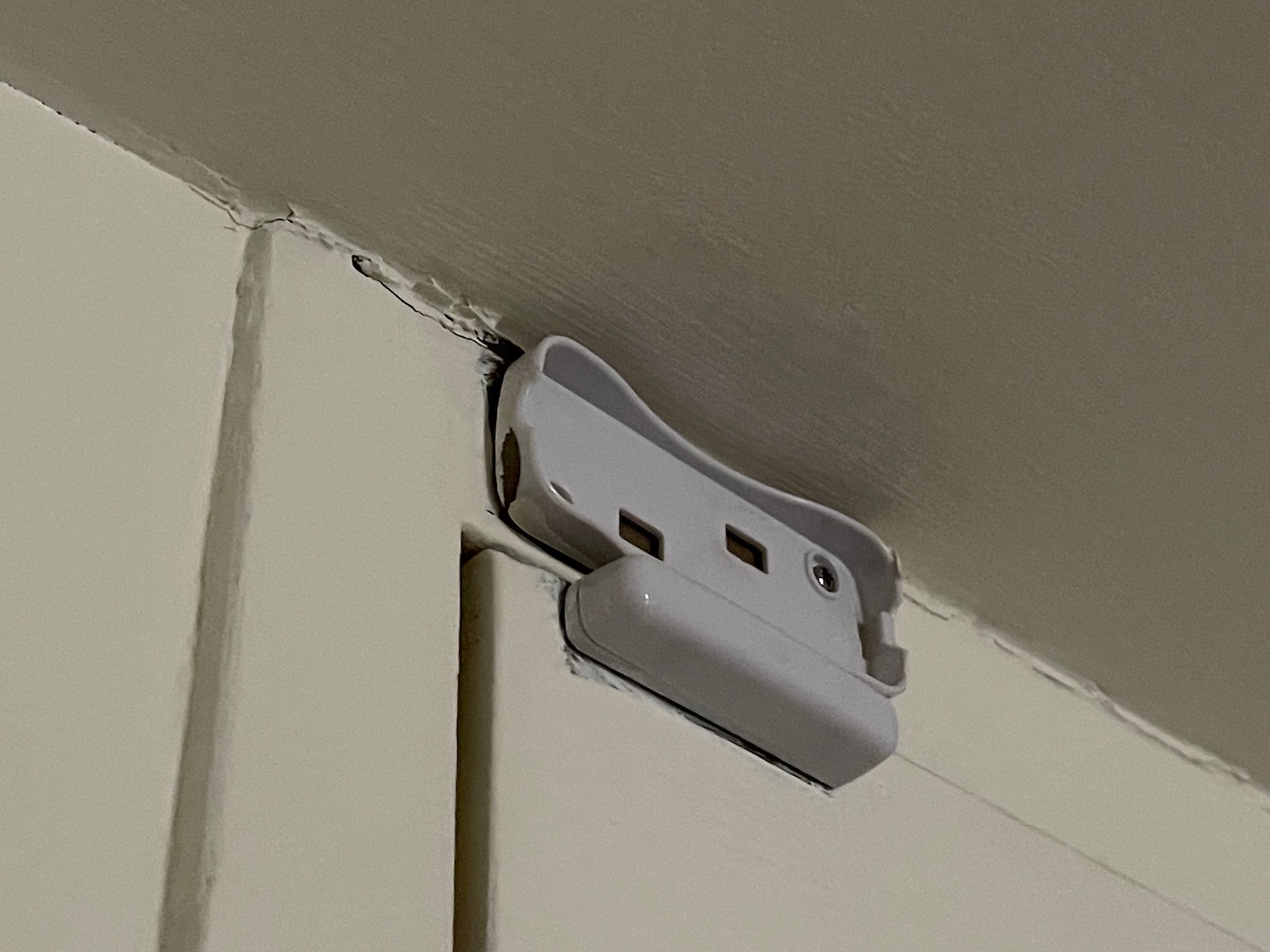 a white device on a wall