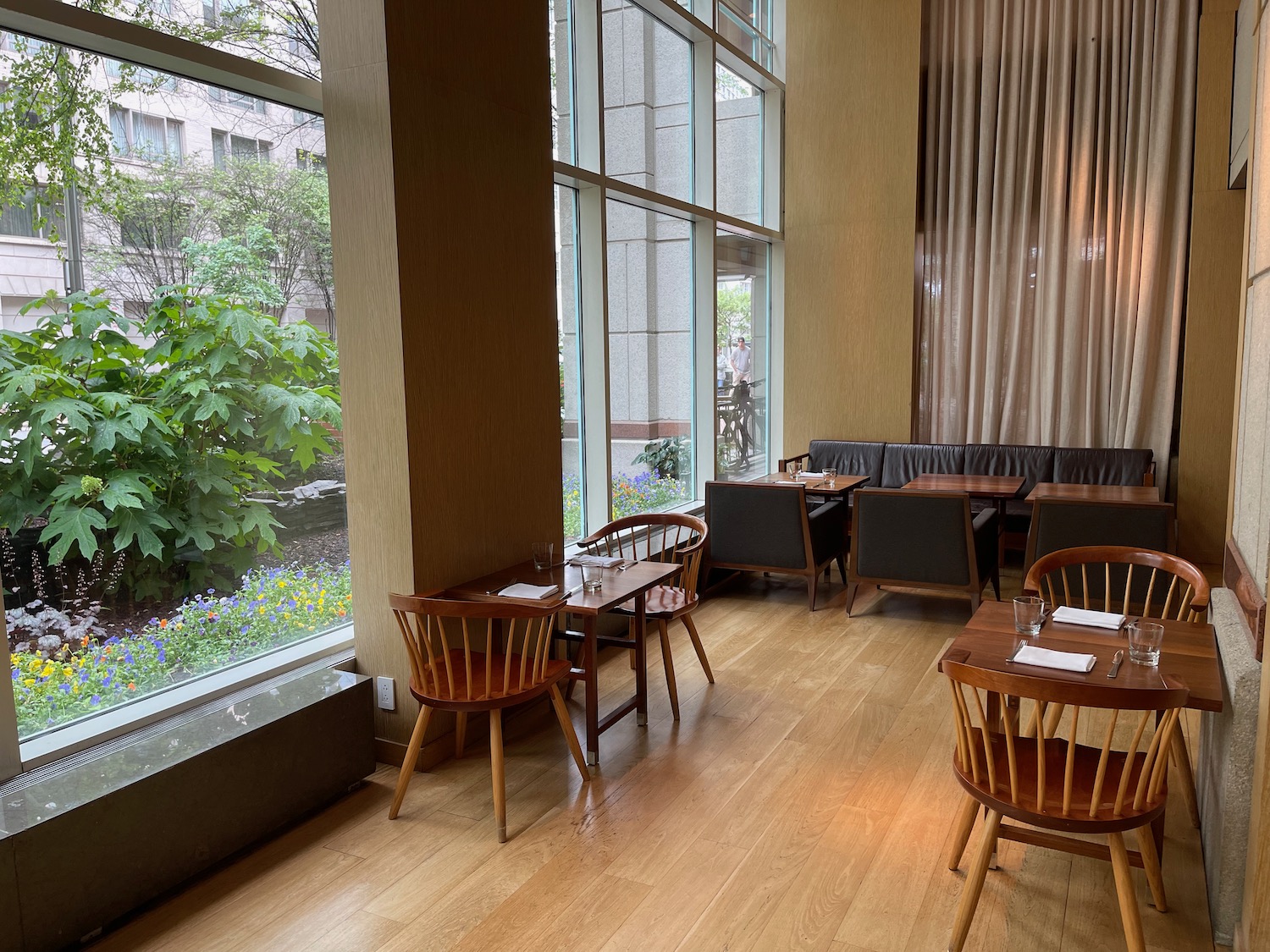 a room with tables and chairs