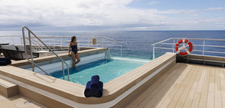 a woman in a swimsuit on a boat