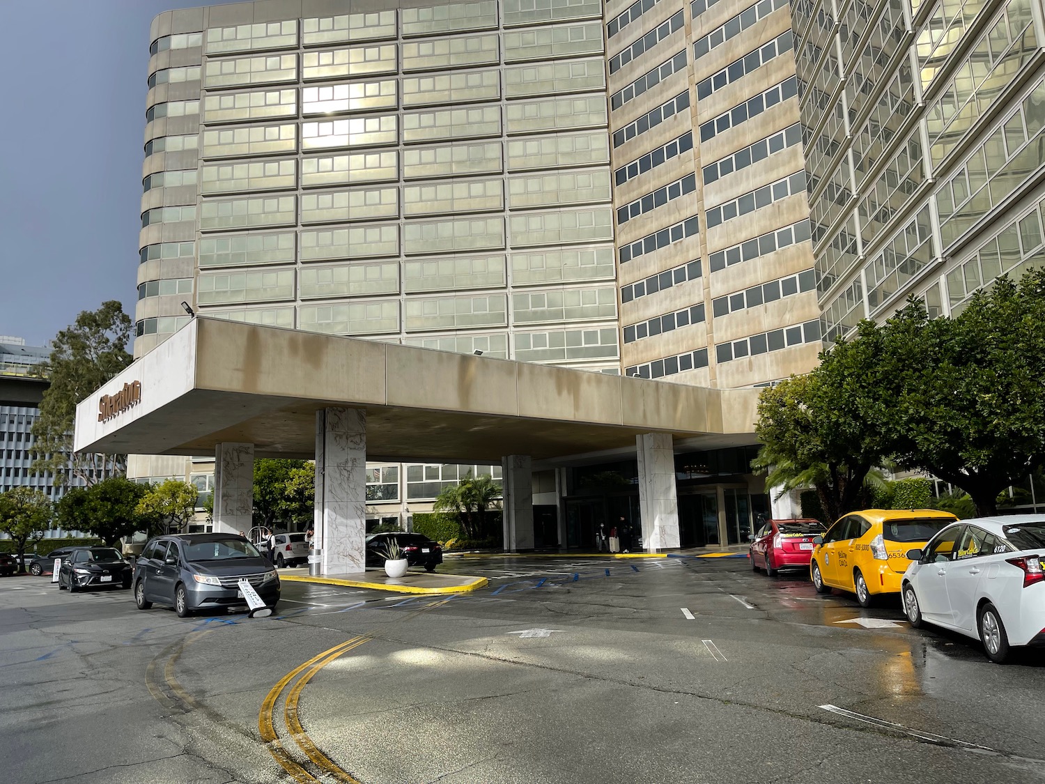 a building with cars parked in front of it