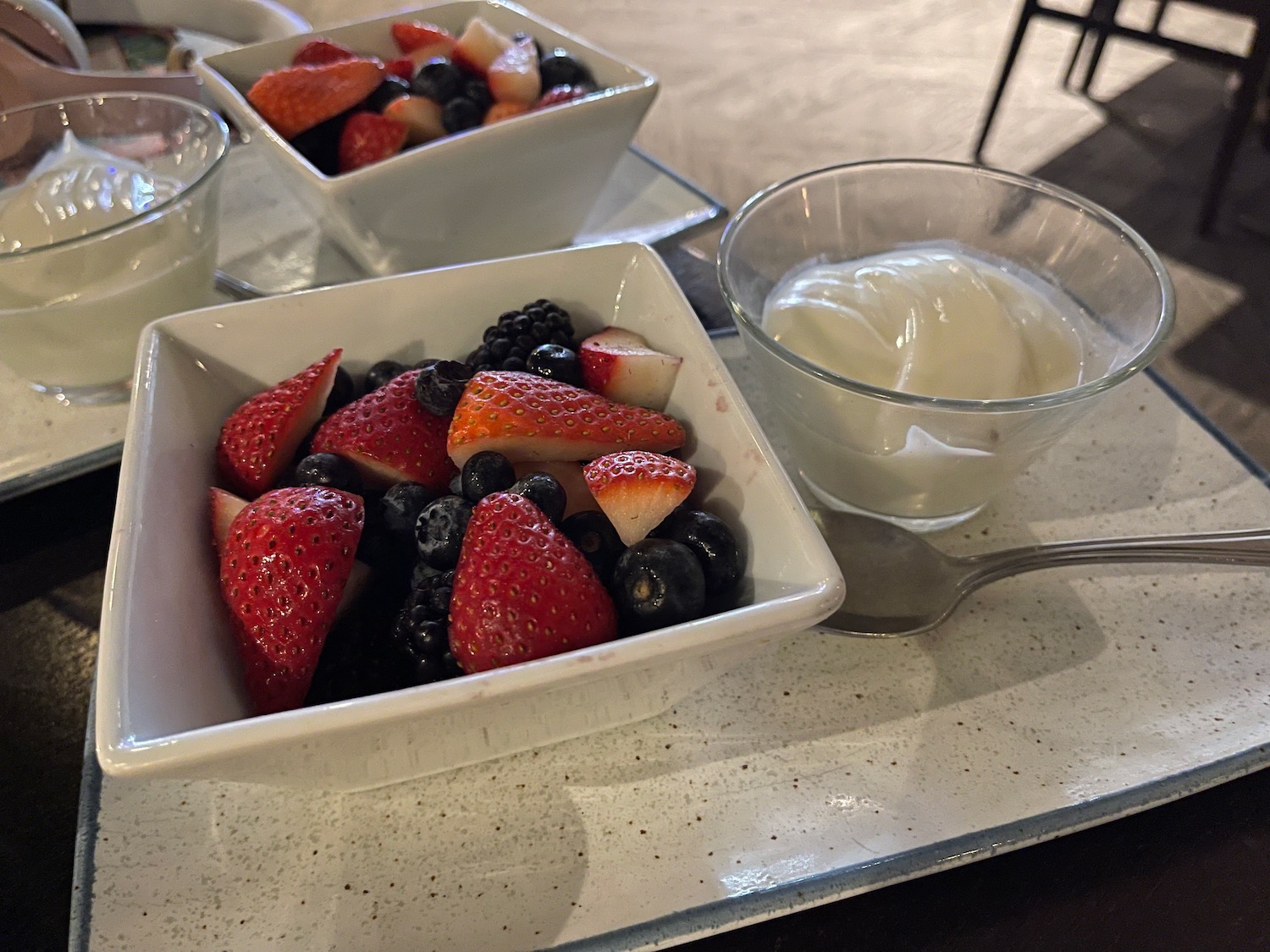 a bowl of fruit and yogurt