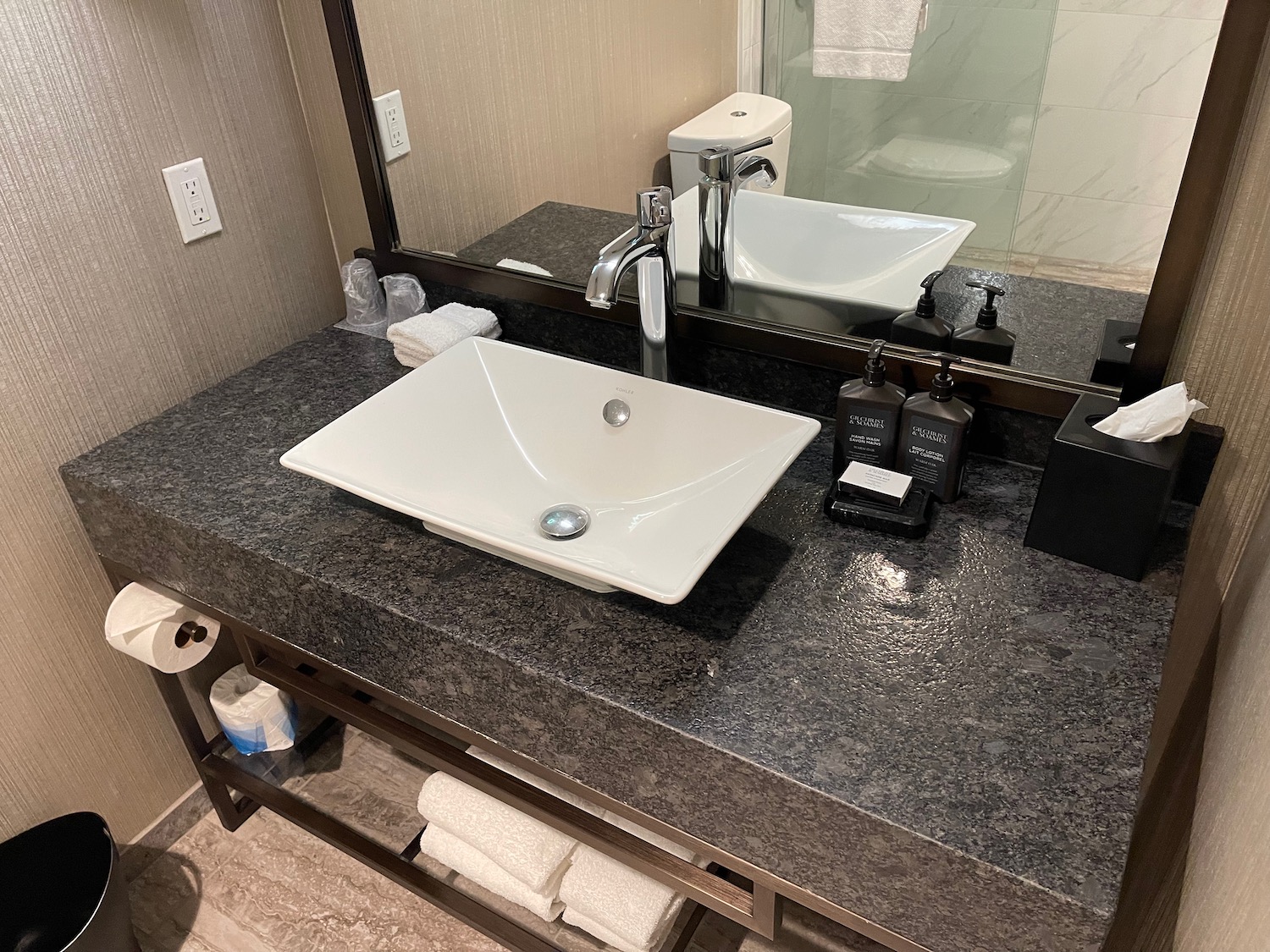 a bathroom sink with a mirror