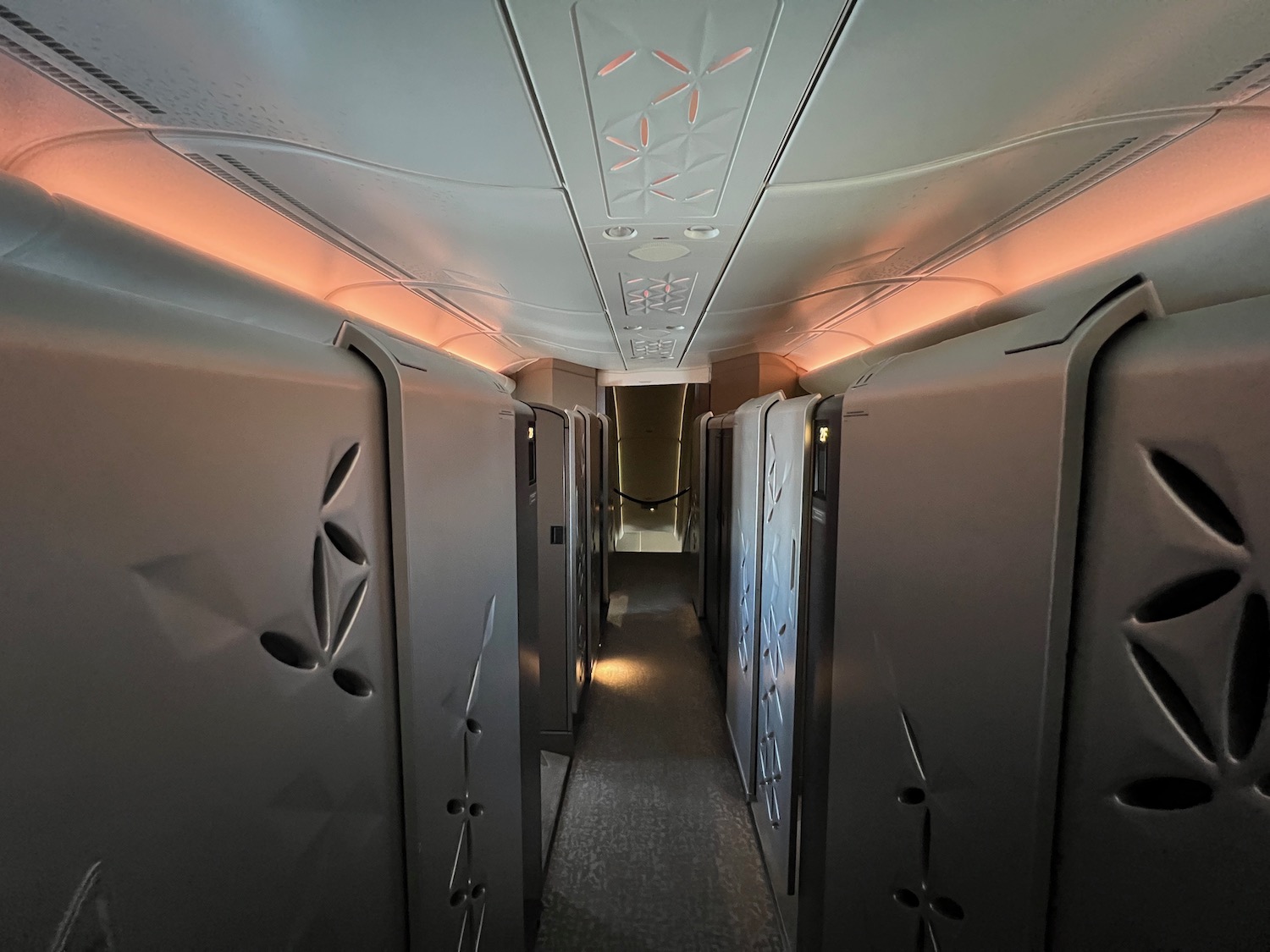 a hallway with lockers and lights