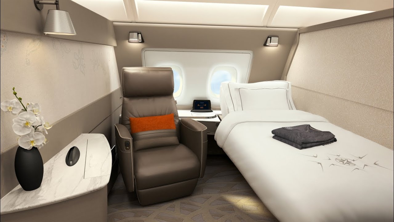 a chair and bed in a plane