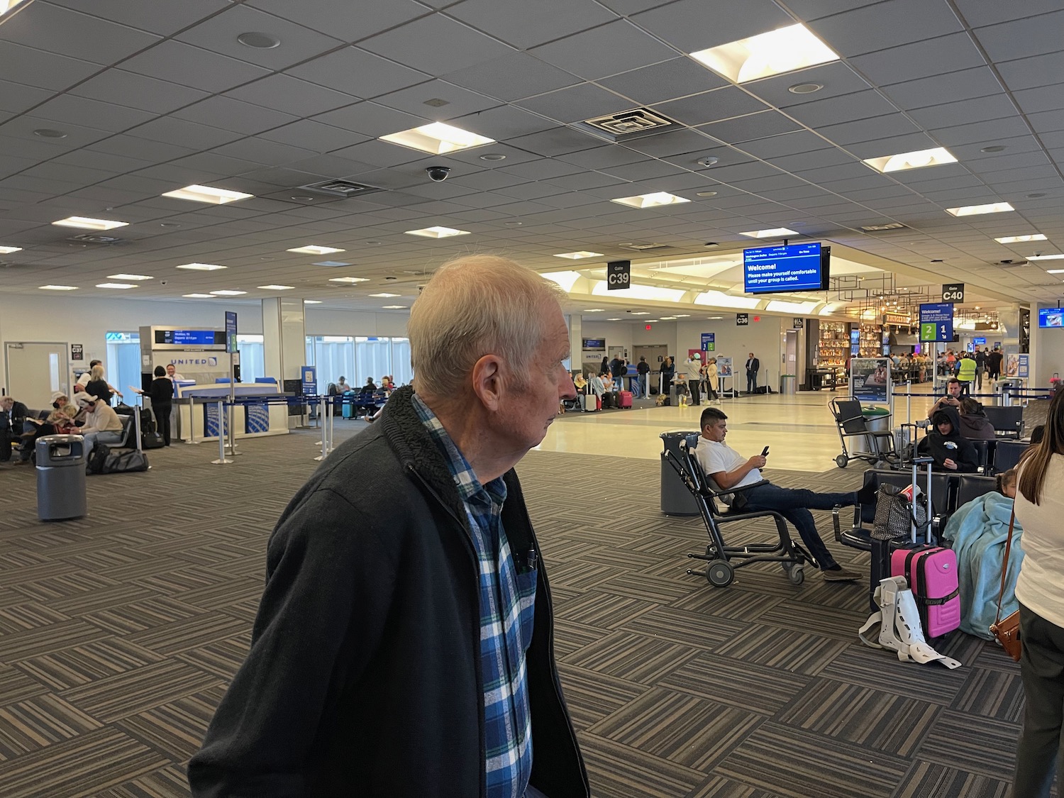 an older man in an airport