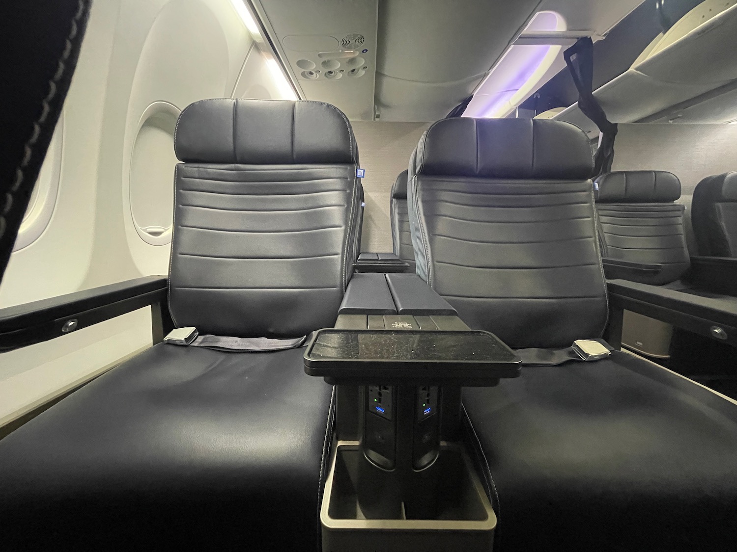 a black seats in an airplane