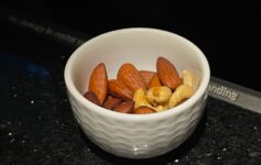 a bowl of nuts on a counter