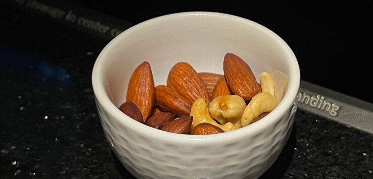 a bowl of nuts on a counter