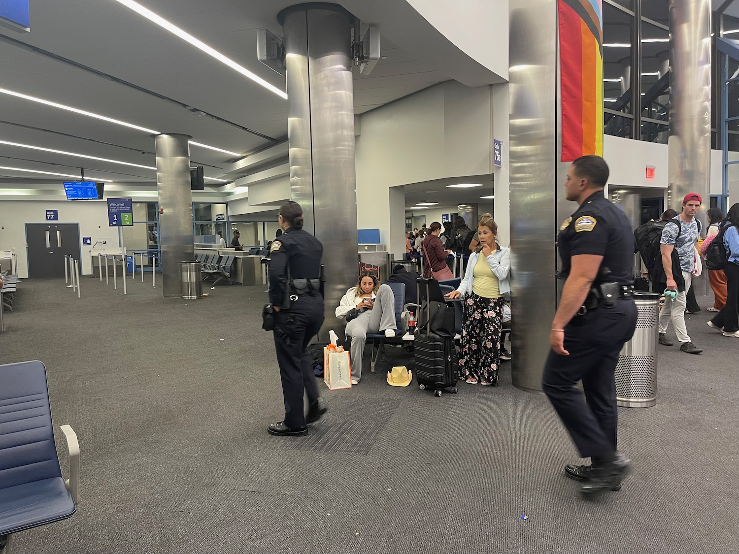 a police officer standing in a terminal