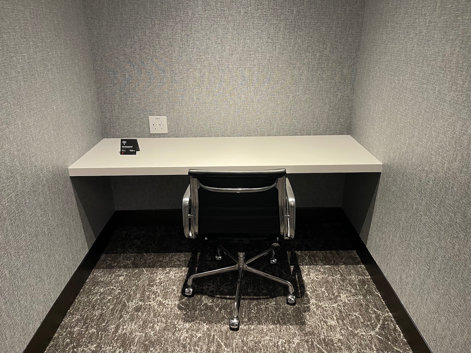 a chair and desk in a room