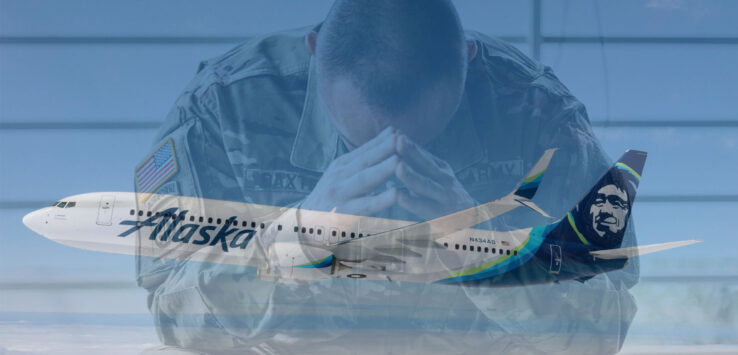 a soldier praying with his hands together