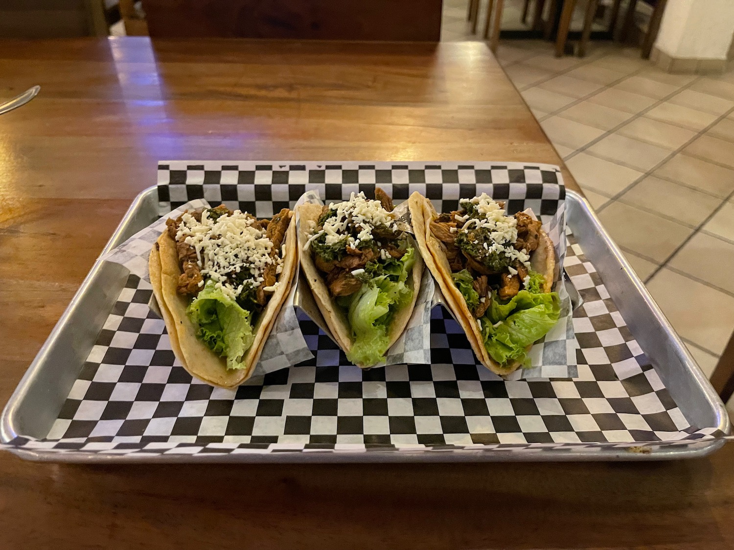 a tray with tacos on it