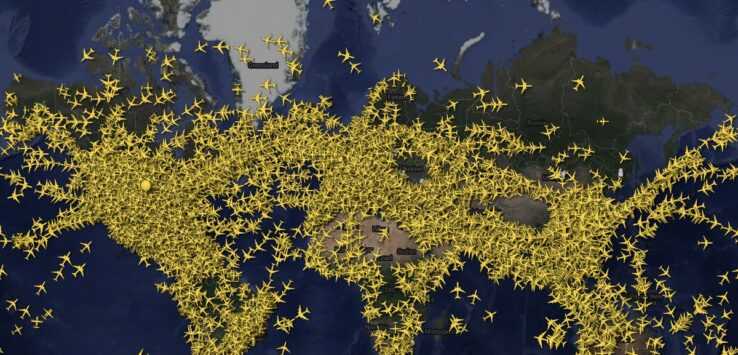 a map of the world with yellow airplanes