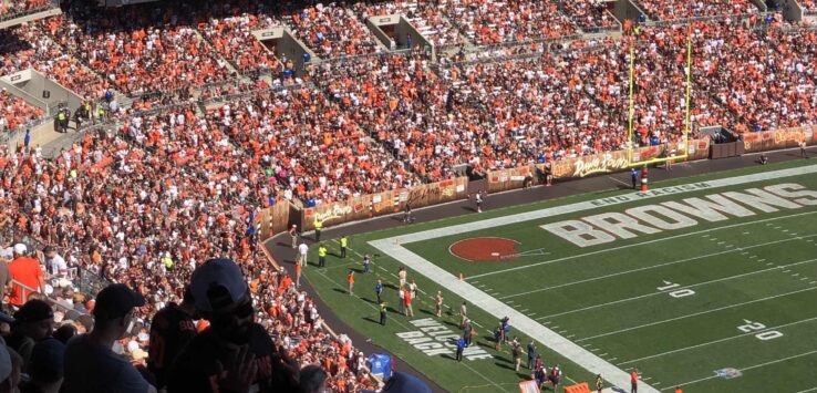 a football stadium with people in the stands