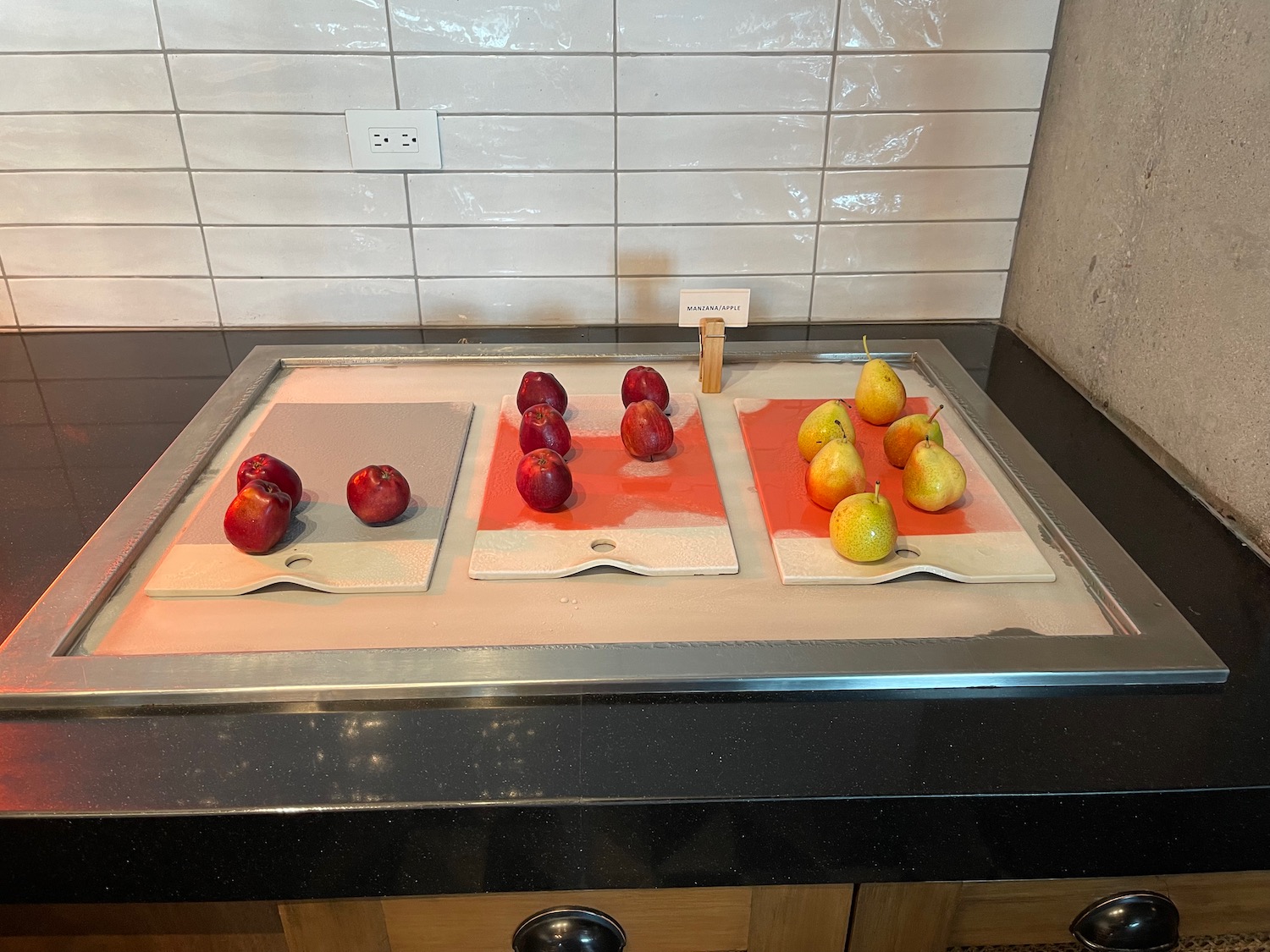 a group of fruits on cutting boards