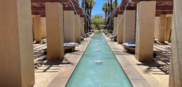 a water fountain in a pool