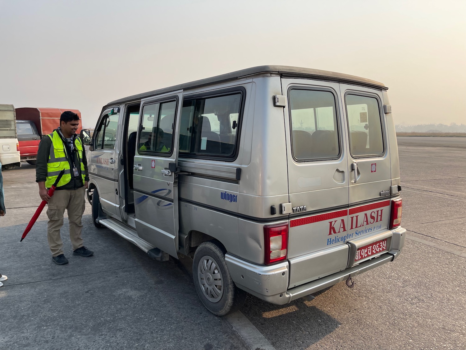 a man standing next to a van