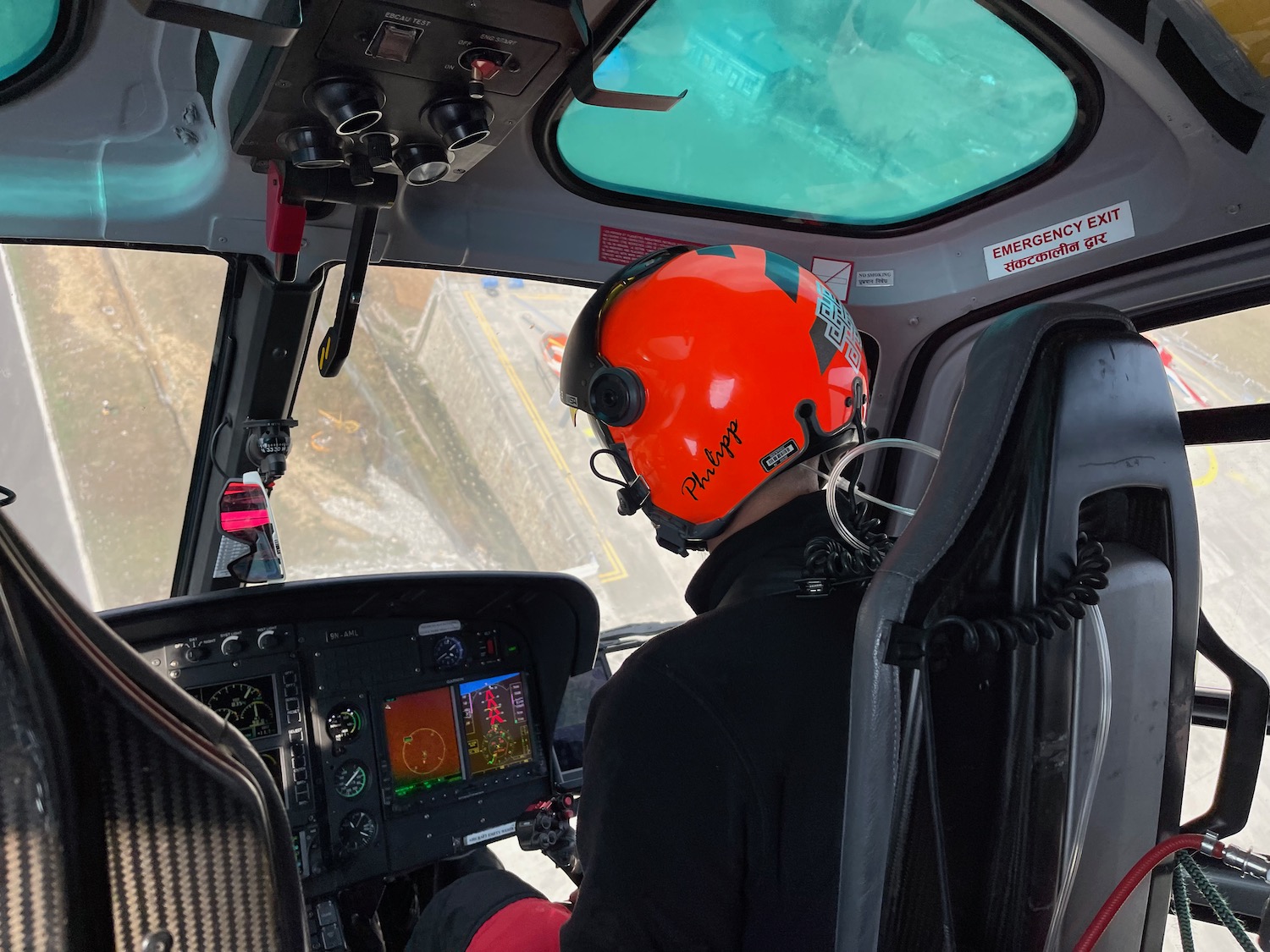 a person in a helicopter cockpit