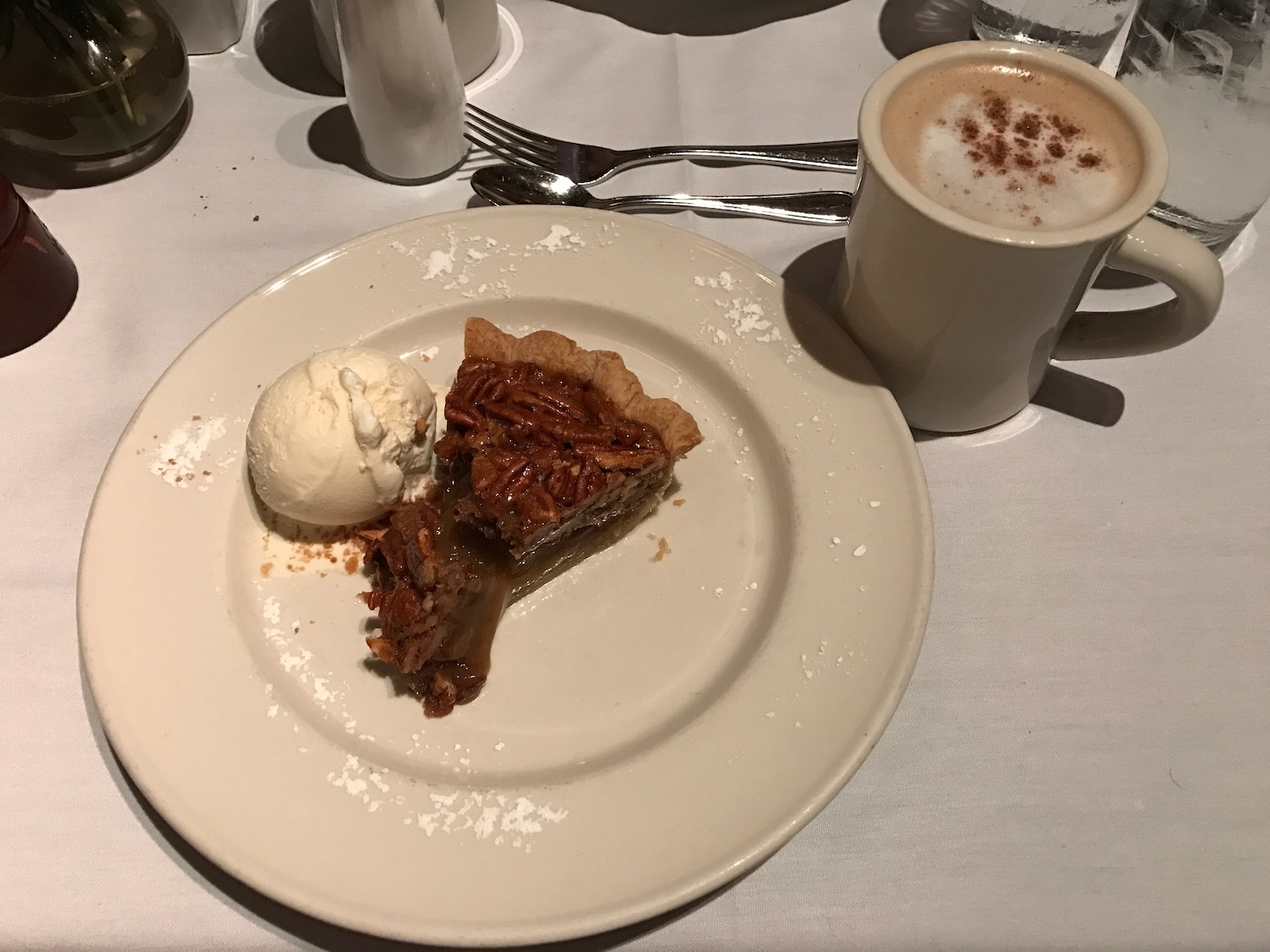 a plate of pie and a cup of coffee