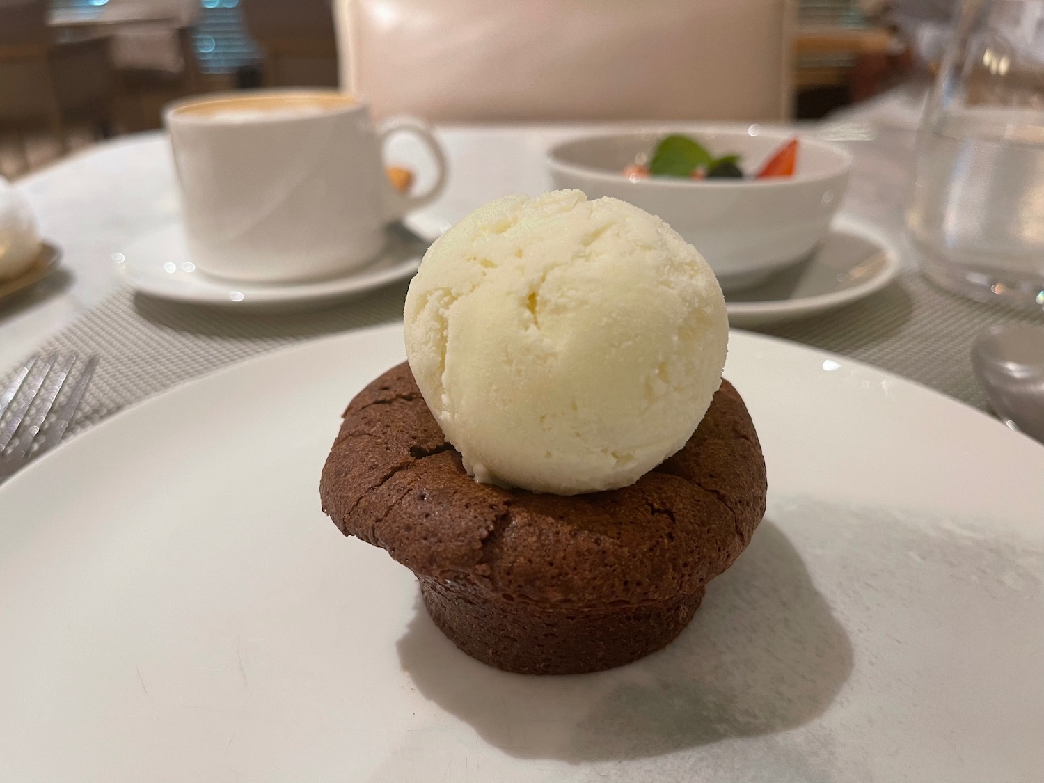 a brownie with a scoop of ice cream on top
