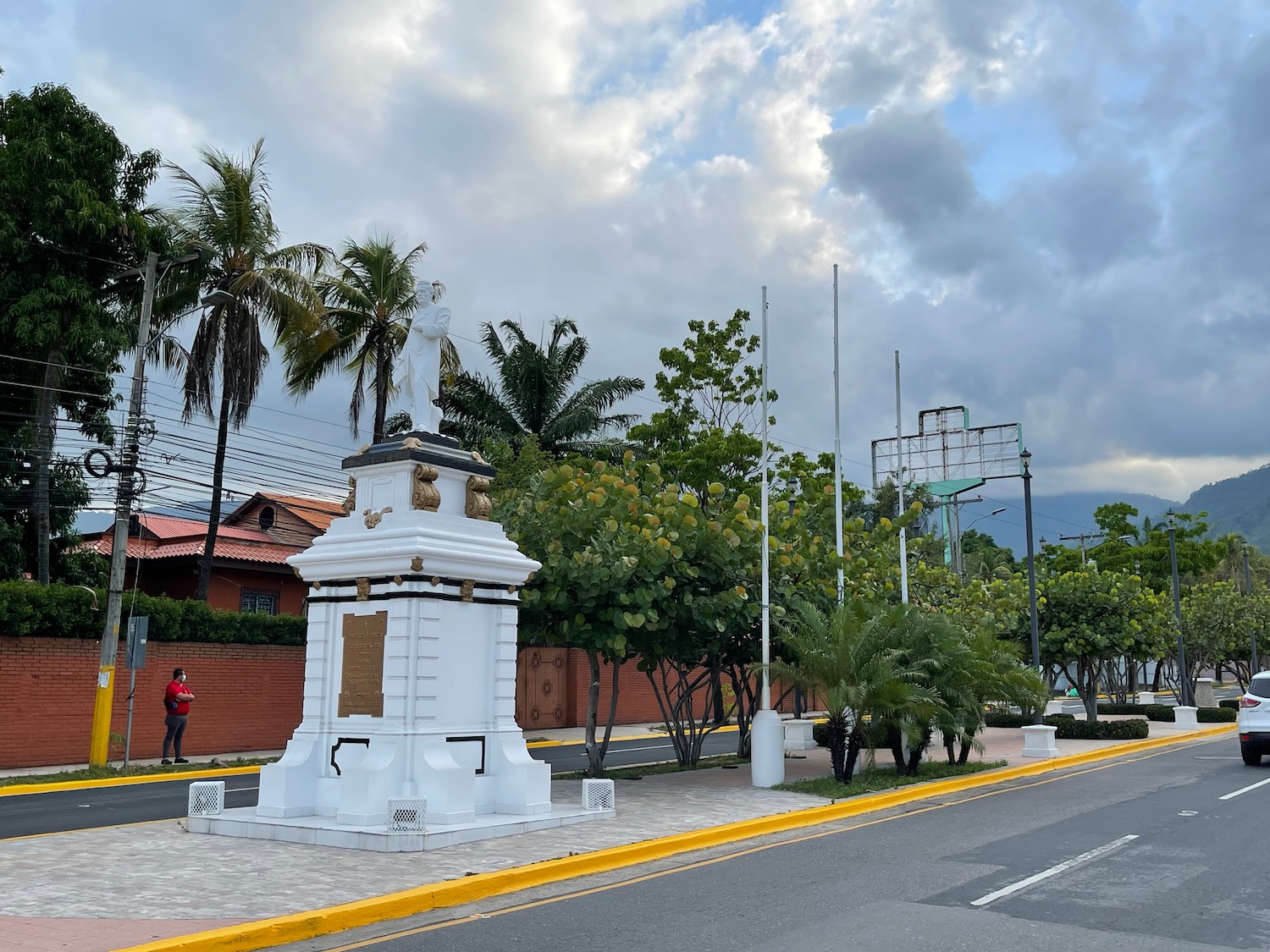 a white statue on a street