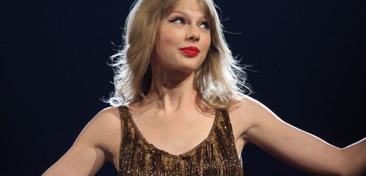 a woman with blonde hair and red lipstick